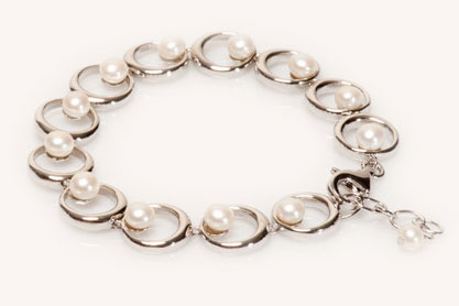 This elegant white pearl bracelet will become your new best friend for day to evening wear.